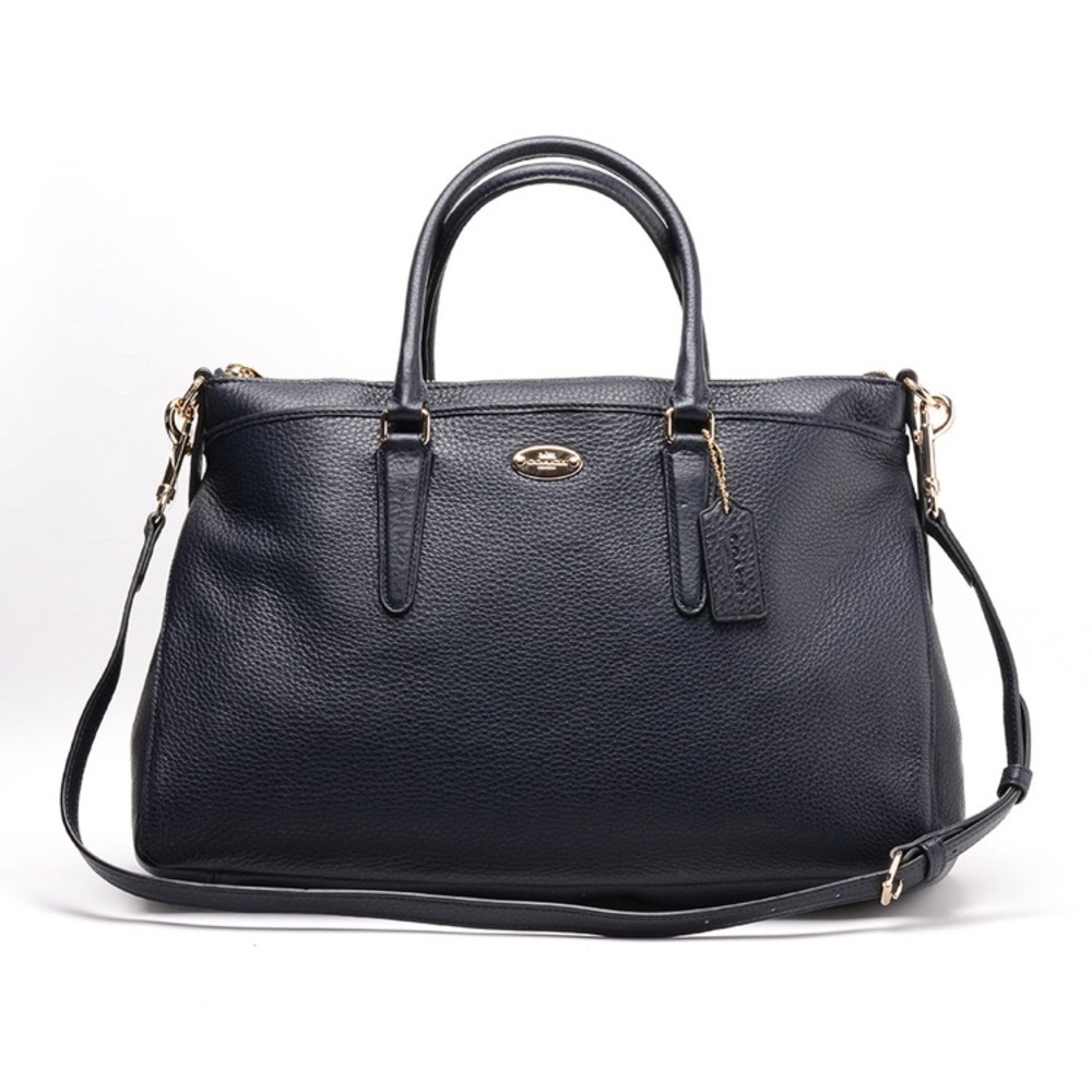 COACH Morgan Pebble Leather Satchel in Dark Blue.
